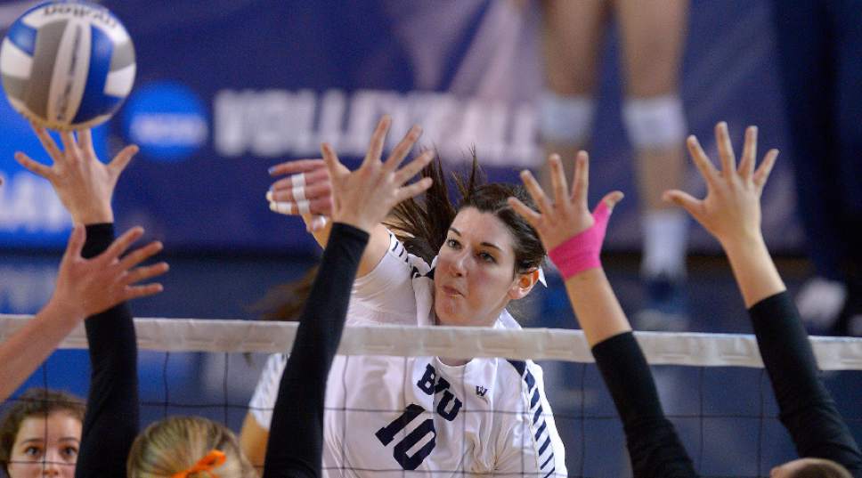 Leah Hogsten  |  The Salt Lake Tribune
BYU middle blocker Amy Boswell (10) slams the ball over the net. Brigham Young University women's volleyball team defeated Princeton 3-0 during the first round of the NCAA tournament Friday, December 2, 2016 on the campus of Brigham Young University.