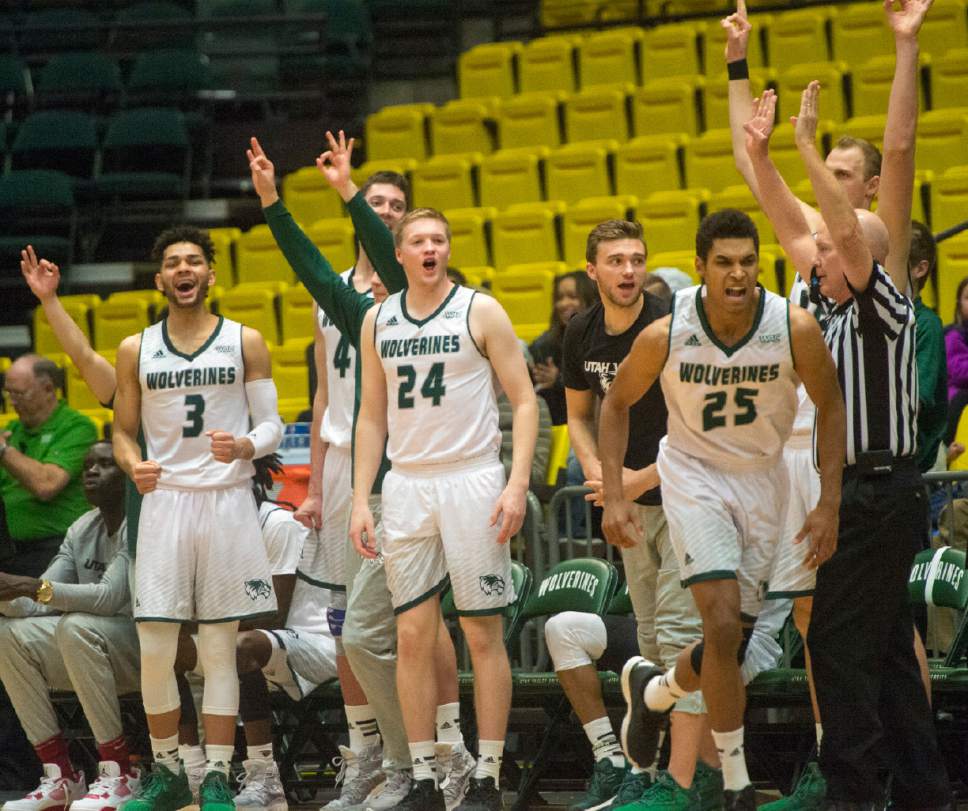 Rick Egan  |  The Salt Lake Tribune

The Wolverine bench reacts as Utah Valley Wolverines guard Kenneth Ogbe (25) hits a big three- point shot in teh second half, in basketball action Utah Valley Wolverines vs. the Texas-San Antonio Roadrunners, in Orem, Saturday, December 3, 2016.