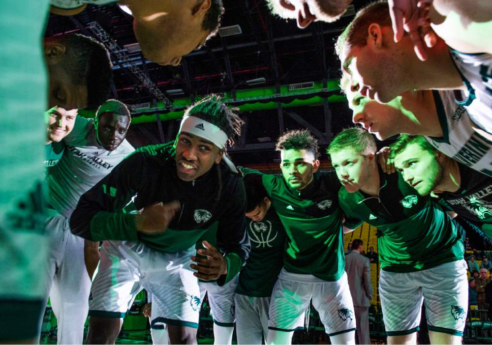Rick Egan  |  The Salt Lake Tribune

Utah Valley Wolverines guard Ivory Young (13) gets the team fired up after player introductions, before basketball action Utah Valley Wolverines vs. the Texas-San Antonio Roadrunners, in Orem, Saturday, December 3, 2016.