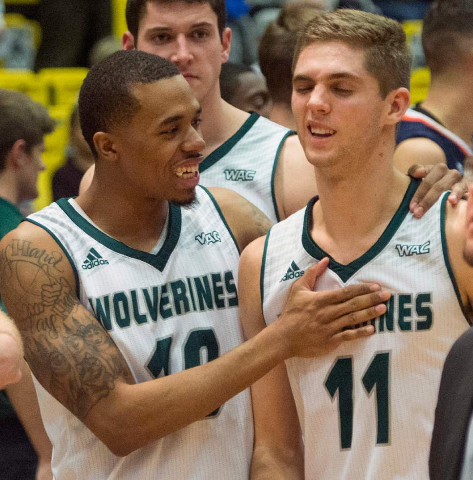 Rick Egan  |  The Salt Lake Tribune

Utah Valley guard Jordan Poydras (10) congratulates Conner Toolson (11), after he scored a career-high 29 points in the Wolverines 75-71 victory over the Texas-San Antonio Roadrunners, in Orem, Saturday, December 3, 2016.