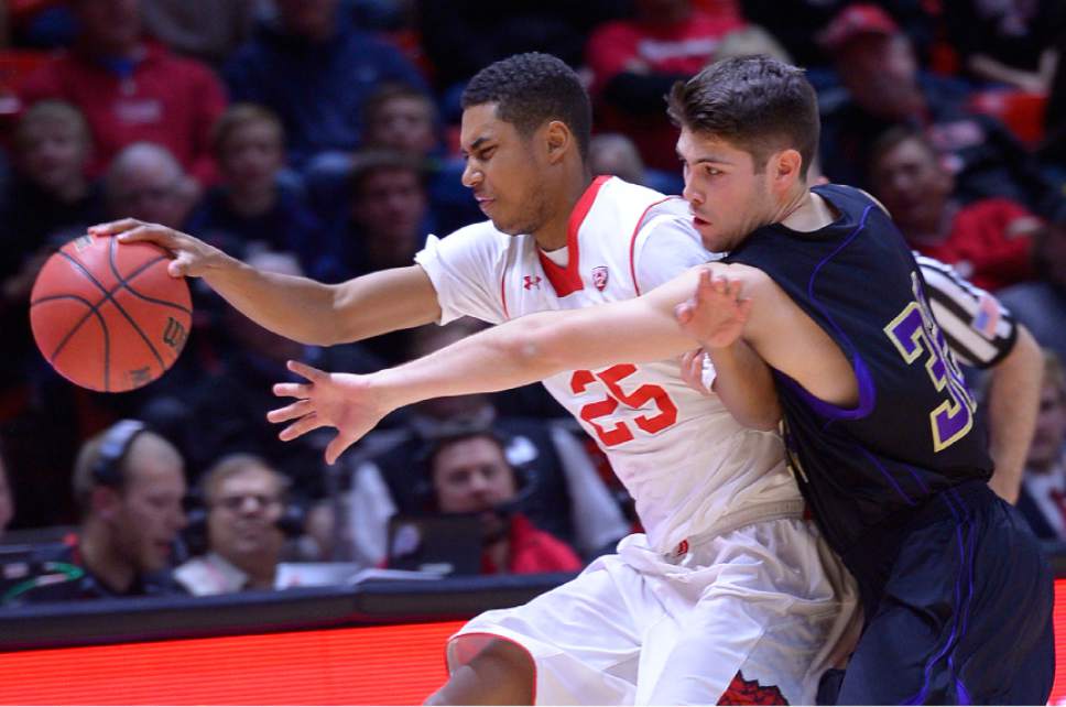 Leah Hogsten  |  The Salt Lake Tribune
Utah Utes guard Kenneth Ogbe (25) and Carroll College's Ryan Imhoff battle for a loose ball.The University of Utah defeated Carroll College 85-49, Tuesday, December 30, 2014 at the Jon M. Huntsman Center.