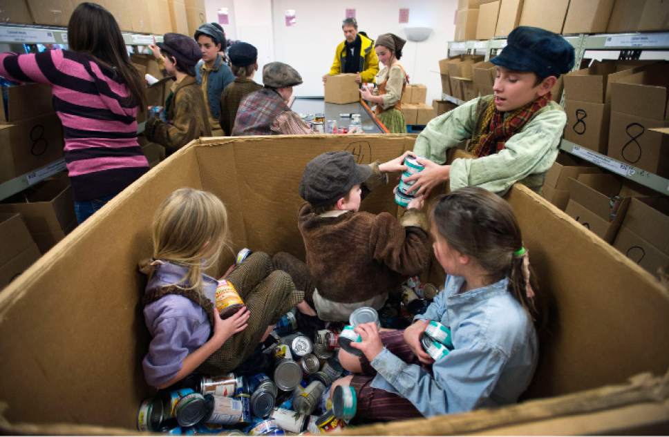 Steve Griffin | The Salt Lake Tribune


Performers from Pioneer Theatre Company's production of "Oliver!" sort food after they performed a song from the play at the Utah Food Bank in Salt Lake City on Monday, Dec. 5, 2016.