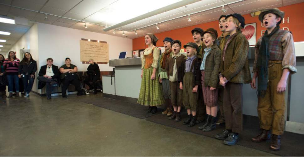Steve Griffin | The Salt Lake Tribune


Performers from Pioneer Theatre Company's production of "Oliver!" sing a song from the play at the Utah Food Bank in Salt Lake City on Monday, Dec. 5, 2016.