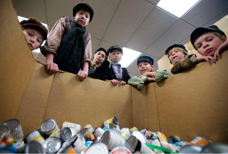 Steve Griffin | The Salt Lake Tribune


Performers from Pioneer Theatre Company's production of "Oliver!" get instructions on how to sort food prior to their musical performance at the Utah Food Bank in Salt Lake City on Monday, Dec. 5, 2016 Charles Dickens' "Oliver" is about a fearless orphan in search of love and his next meal and forced into a life of pick-pocketing. Patrons of Pioneer Theatre Company's family production will be bringing food donations to the shows throughout its run through Dec. 17, 2016.