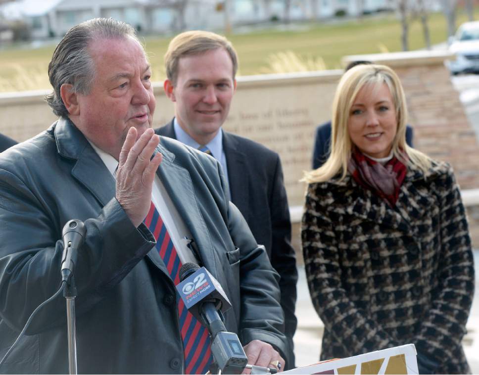 Al Hartmann  |  The Salt Lake Tribune
Taylorsville Mayor Larry Johnson, left, joins Salt Lake County Mayor Ben McAdams, County Council member Aimee Winder Newton and arts patrons Monday Dec. 5 to announce a new Mid-Valley Performing Arts Center that will be built just to the southeast of Taylorsville City Hall at 5600 S. and 2600 W. 
The Mid-Valley Performing Arts Center will be easily accessible for residents particularly in the fast-growing southwest area of the valley. As Salt Lake County's population expands, McAdams says it is important to create cultural spaces that are closer-to-home for many residents and that can be home for both large and small local arts organizations, and national and regional shows.