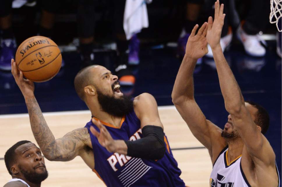 Steve Griffin / The Salt Lake Tribune


Phoenix Suns center Tyson Chandler (4) powers his way to the basket during the Utah Jazz versus the Phoenix Suns NBA game at Vivint Smart Home Arena in Salt Lake City Tuesday December 6, 2016.