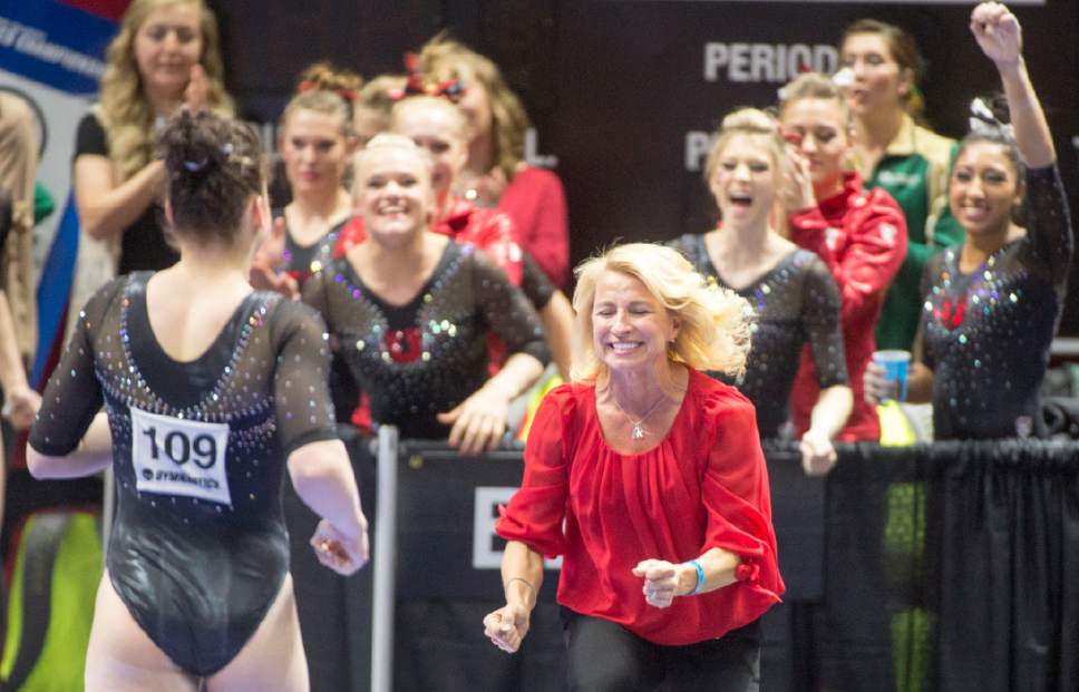 Rick Egan  |  The Salt Lake Tribune

Utah head coach Megan Marsden congratulates Samantha Partyka after her balance beam routine, in the NCAA Regional Championships, at the Huntsman Center, Saturday, April 2, 2016.