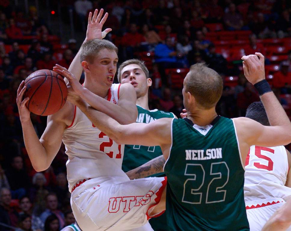 Leah Hogsten  |  The Salt Lake Tribune
Utah Utes forward Tyler Rawson (21) fights Utah Valley Wolverines forward Isaac Neilson (22) for the rebound. University of Utah defeated Utah Valley University 87-80 during their non-conference game Tuesday, December 6, 2016 at the Jon M. Huntsman Center.