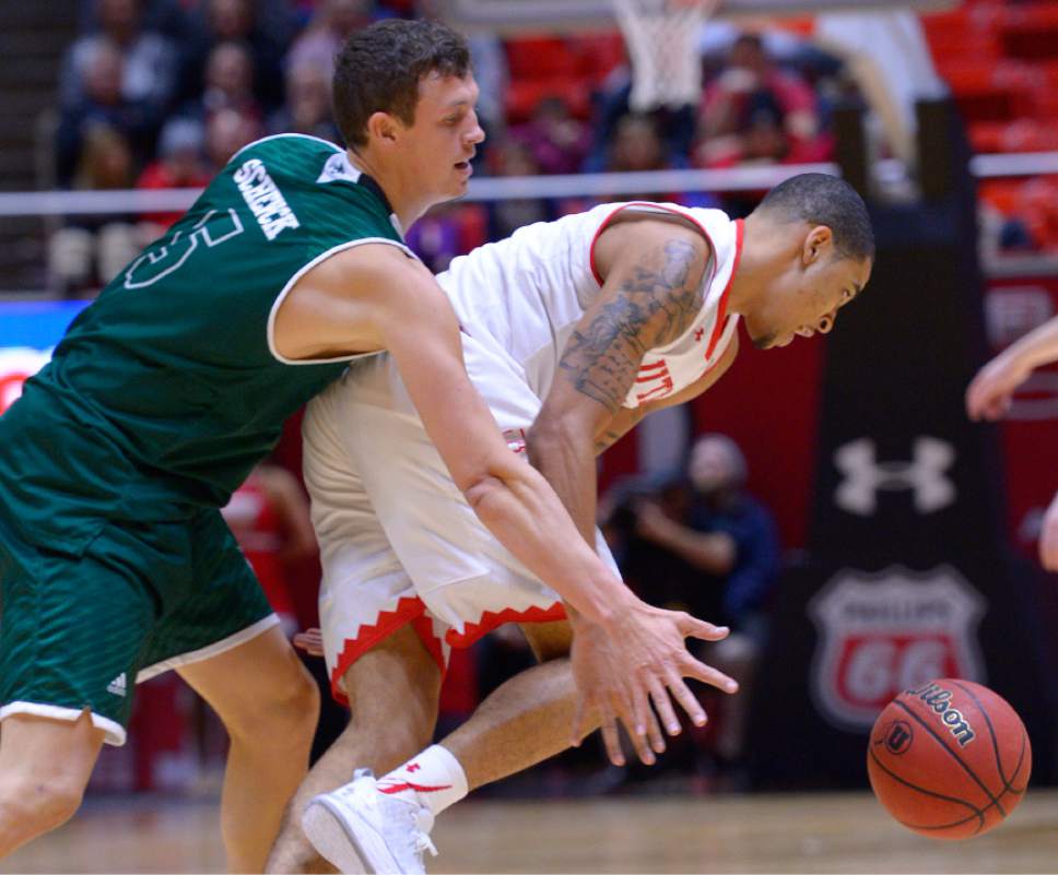 Leah Hogsten  |  The Salt Lake Tribune
Utah Utes guard JoJo Zamora (1) gets the ball back after Utah Valley Wolverines guard Hayden Schenck (5) knocks it out of his hands. University of Utah defeated Utah Valley University 87-80 during their non-conference game Tuesday, December 6, 2016 at the Jon M. Huntsman Center.