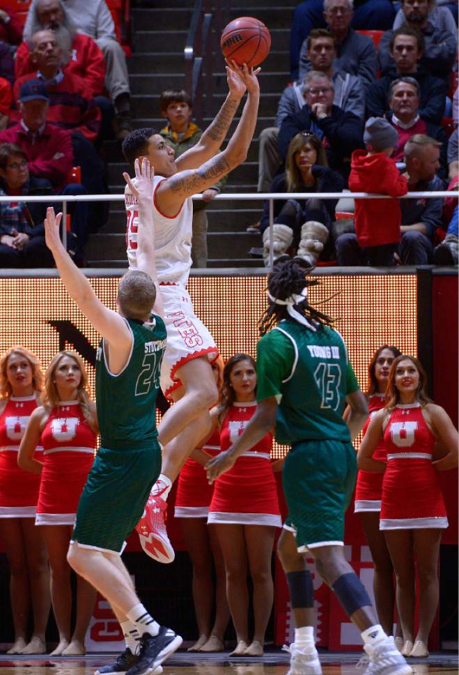 Leah Hogsten  |  The Salt Lake Tribune
Utah Utes guard Kenneth Ogbe fires off a 3-pointer. University of Utah defeated Utah Valley University 87-80 during their non-conference game Tuesday, December 6, 2016 at the Jon M. Huntsman Center.