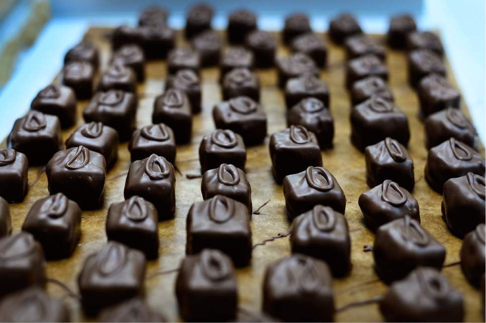 Scott Sommerdorf   |  The Salt Lake Tribune  
Finished candies sit to dry after having been covered in fresh chocolate, at Condie's Candies in Salt Lake City, Thursday, Dec. 1, 2016.  For four generations -- spanning 92 years -- the seasonal family-run business has been making and selling chocolates and other treats for Christmas.