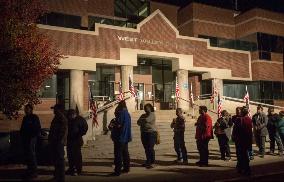 Rick Egan  |  The Salt Lake Tribune

With 30 minutes left to vote, there are still long lines outside the West Valley City Hall, Tuesday, November 8, 2016.