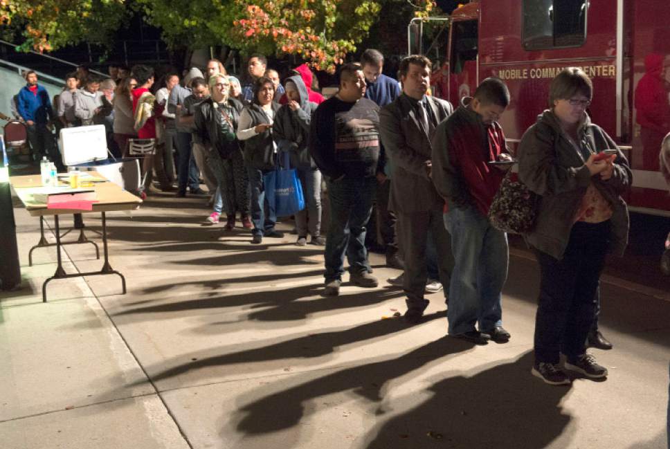 Rick Egan  |  The Salt Lake Tribune

With 30 minutes left to vote, there are still long lines outside the West Valley City Hall, Tuesday, November 8, 2016.