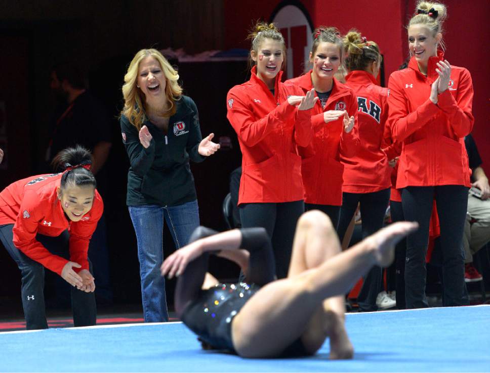 Leah Hogsten  |  The Salt Lake Tribune
The team reacts to Macey Roberts at the end of her floor routine. University of Utah gymnastics fans got their first glimpse of this year's team at the Red Rocks Preview intrasquad meet at the Huntsman Center, Friday, December 9, 2016.