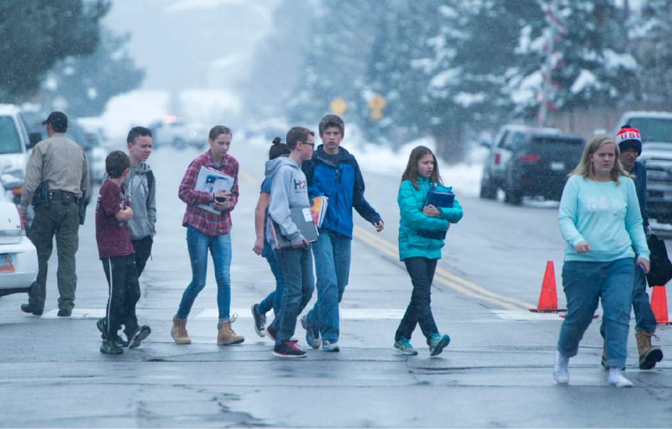Rick Egan  |  The Salt Lake Tribune

Mueller Park Jr. High, students walk to the church where their parents are waiting for them, as they are released from school, after a shooting at Mueller Park Jr. High, in Bountiful, Thursday, December 1, 2016.