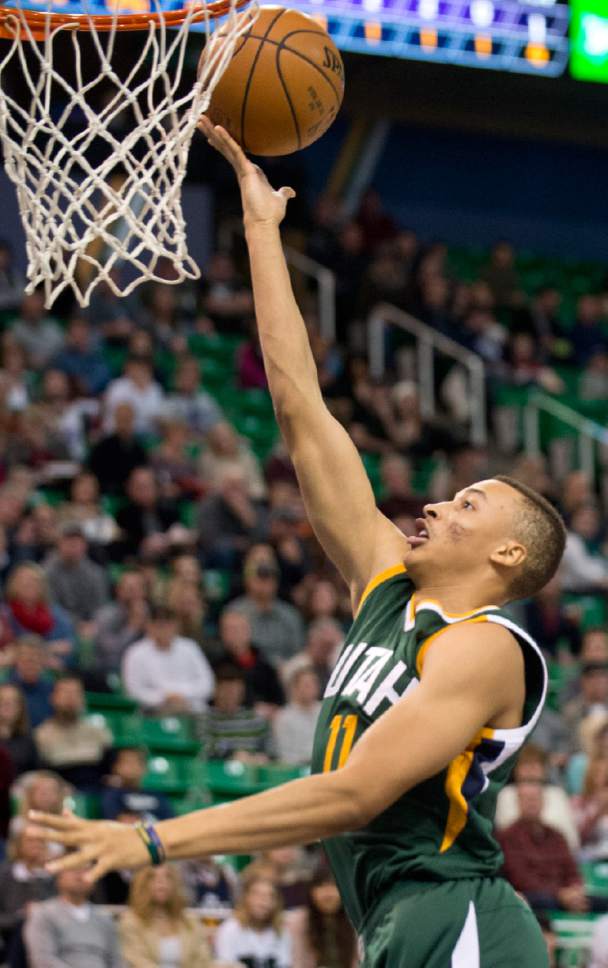 Lennie Mahler  |  The Salt Lake Tribune

Dante Exum lays the ball up in the first half of a game against the Sacramento Kings on Saturday, Dec. 10, 2016, at Vivint Smart Home Arena in Salt Lake City.