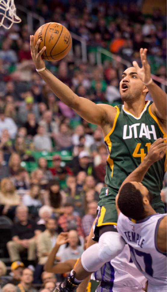Lennie Mahler  |  The Salt Lake Tribune

Trey Lyles draws a foul from Sacramento's Garrett Temple and scores a basket in the first half of a game Saturday, Dec. 10, 2016, at Vivint Smart Home Arena in Salt Lake City.