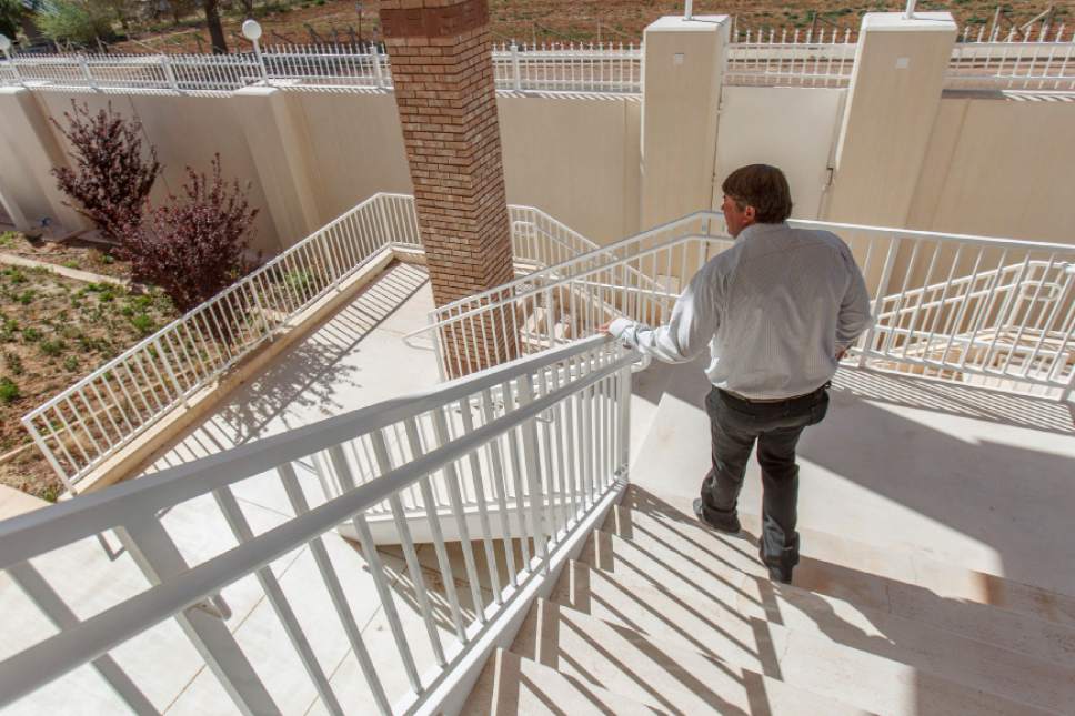 Trent Nelson  |  The Salt Lake Tribune
Willie Jessop on the steps of a home intended for the family of Warren Jeffs in Hildale, Friday April 26, 2013. The property was purchased by Willie Jessop who spent the day allowing former followers to see the inside of a compound they had previously not been allowed to enter.