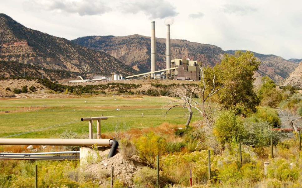 Brian Maffly  |  The Salt Lake Tribune
Rocky Mountain Power operates this "research farm," which it irrigates with wastewater from its coal-fired Huntington Power Plant, seen in the background.  Now the utility hopes to pipe millions of gallons of mine discharge to a retention pond serving these fields as part of its plan to close the nearby Deer Creek coal mine in Utah's Emery County. Enviornmental groups want the Forest Service, which has authorized the necessary pipeline, to take a harder look at the project.