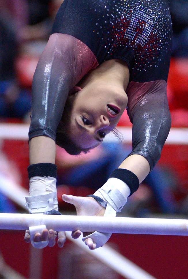 Leah Hogsten  |  The Salt Lake Tribune
Baely Rowe performs her bars routine. University of Utah gymnastics fans got their first glimpse of this year's team at the Red Rocks Preview intrasquad meet at the Huntsman Center, Friday, December 9, 2016.