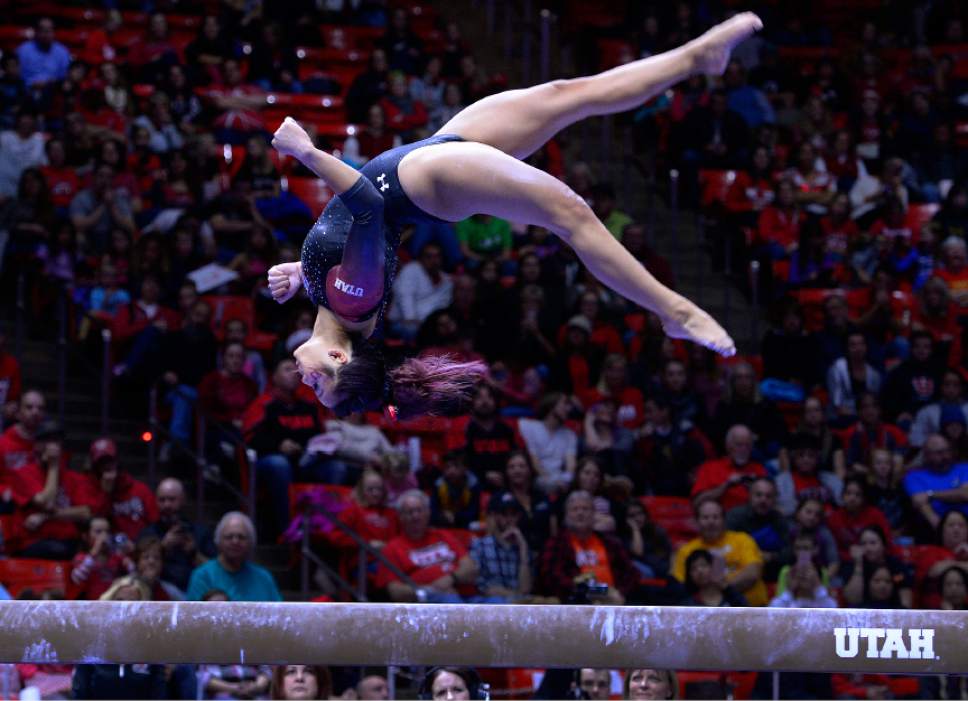 Leah Hogsten  |  The Salt Lake Tribune
Kari Lee performs her beam routine. University of Utah gymnastics fans got their first glimpse of this year's team at the Red Rocks Preview intrasquad meet at the Huntsman Center, Friday, December 9, 2016.