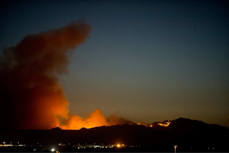 Lennie Mahler  |  The Salt Lake Tribune

A fire burns on Antelope Island, seen from downtown Salt Lake City, Friday, July 22, 2016.