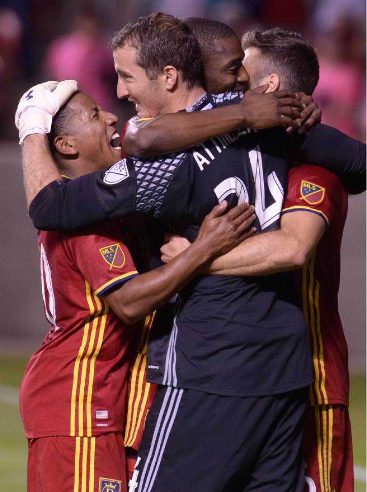 Leah Hogsten  |  The Salt Lake Tribune
Real Salt Lake forward Joao Plata (10) and Real Salt Lake defender Aaron Maund (21) run to celebrate with Real Salt Lake goalkeeper Jeff Attinella (24). Real Salt Lake defeated Wilmington Hammerheads FC 2-2 and 3-1in the shoot out during their fourth round 2016 U.S. Open Cup match at Rio Tinto Stadium, Tuesday, June 14, 2016 in Sandy.