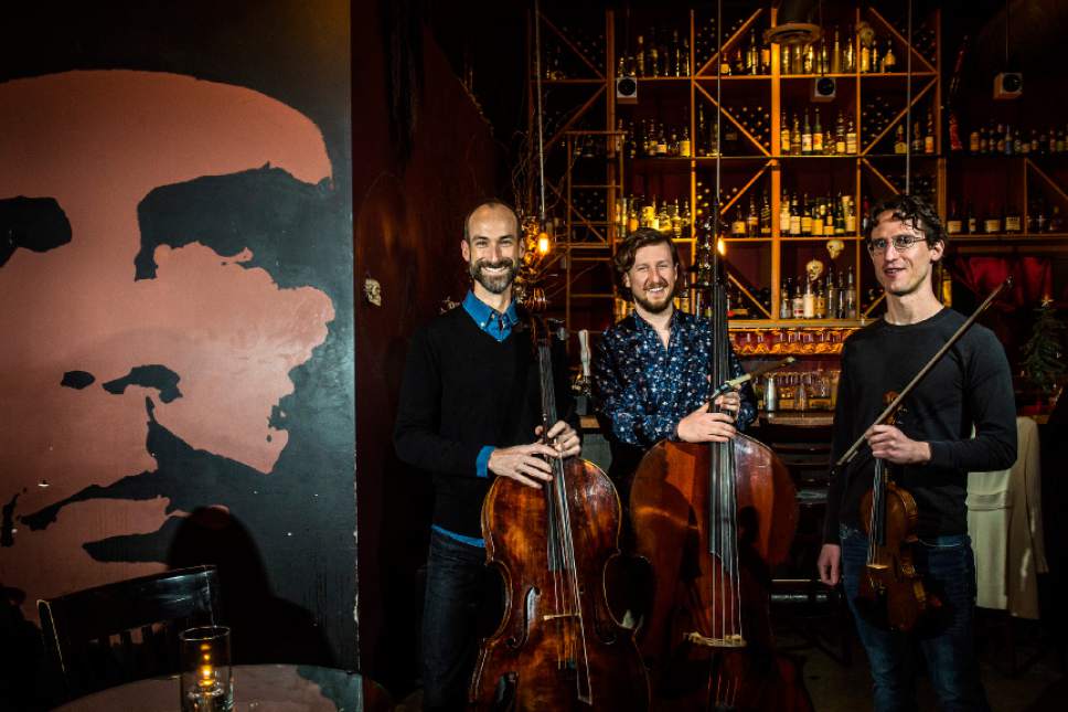 Chris Detrick  |  The Salt Lake Tribune
MOTUS After Dark musicians Walter Haman, cello, Ted Merrit, bass, and Alex Martin, violin, pose for a portrait at The Red Door on Friday, Dec. 2, 2016.