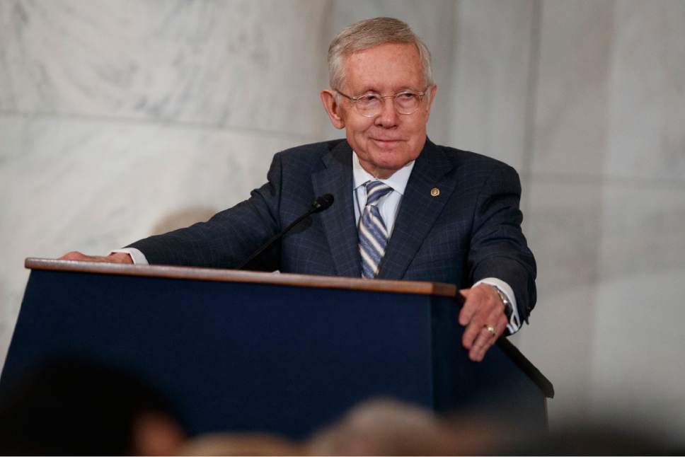 Sen. Harry Reid, D-Nev., speaks during during a ceremony to unveil his portrait, on Capitol Hill, Thursday, Dec. 8, 2016, in Washington. (AP Photo/Evan Vucci)