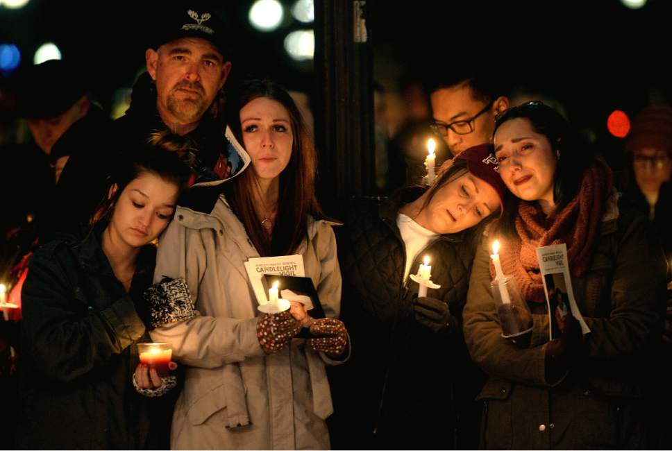 Steve Griffin / The Salt Lake Tribune


Family members of James Swift mourn their loss as they attend a candle light vigil during the "Homeless Persons Memorial Day" gathering for all the homeless people who died in the past year, at Pioneer Park in Salt Lake City Tuesday December 13, 2016.