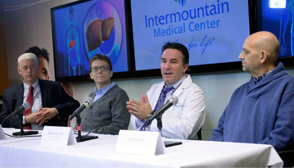 Al Hartmann  |  The Salt Lake Tribune
Tracy Schmidt, Executive Director for Intermountain Donor Services, left, patient Lorenzo Swank, Richard Gilroy, MD, Medical Director for Liver Transplantation Program and patient David Ericson meet in a press conference at Intermountain Medical Center in Murray Tuesday Dec. 13.  
There's new hope for patients with liver disease who are waiting for a donor liver to become available for transplantation. Doctors at the Intermountain Medical Center Transplant Program in Murray are using a new method to utilize donated livers that may significantly increase the number of donor livers that are available for thousands of people waiting for a live-saving transplant.
Currently, 12,000 people are added to the liver transplant waiting list every year, but only 7,000 receive a transplant. This creates a supply-and-demand disparity that results in about 1,500 people dying each year while waiting for a donated liver to become available for transplant. The Intermountain Medical Center Transplant Program is the first Utah transplant center to use diseased donated livers for transplantation. They are also among the first transplant centers in the United States to launch this new method to help address the liver supply-demand disparity.