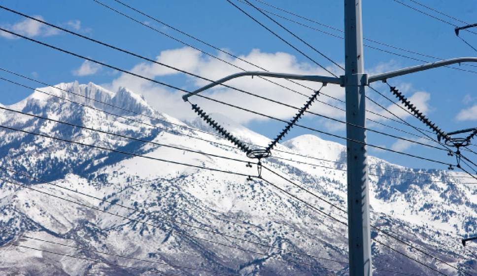 Al Hartmann   |  The Salt Lake Tribune
A power transmission line tower along Redwood Road just north of Camp Williams frames Lone Peak above Draper.