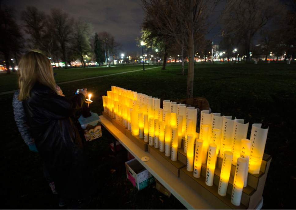 Steve Griffin / The Salt Lake Tribune


People light candles during the "Homeless Persons Memorial Day" gathering for all the homeless people who died in the past year, at Pioneer Park in Salt Lake City Tuesday December 13, 2016.