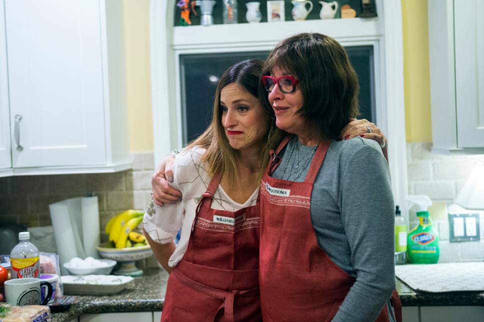 Chris Detrick  |  The Salt Lake Tribune
Cooking instructor Marguerite Henderson hugs her daughter Sarah Collins during a class at her home in Salt Lake City Tuesday December 6, 2016.