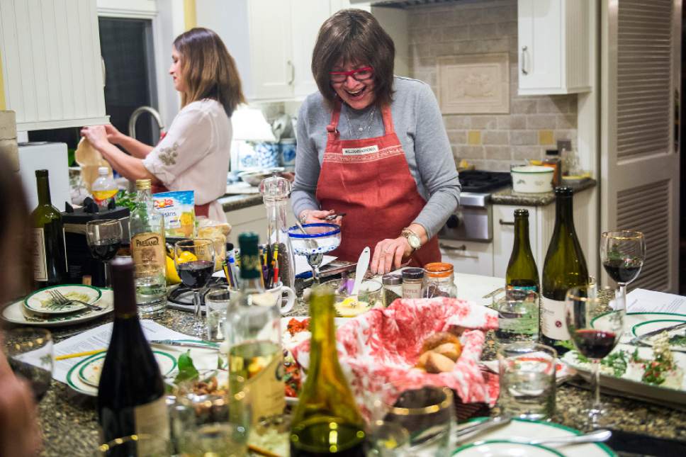 Chris Detrick  |  The Salt Lake Tribune
Cooking instructor Marguerite Henderson talks with her students about making a tomato and olive tart during a class at her home in Salt Lake City Tuesday December 6, 2016.