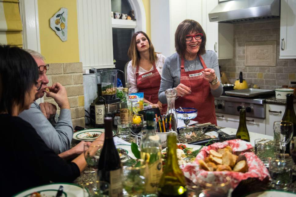 Chris Detrick  |  The Salt Lake Tribune
Cooking instructor Marguerite Henderson talks with her students during a class at her home in Salt Lake City Tuesday December 6, 2016.