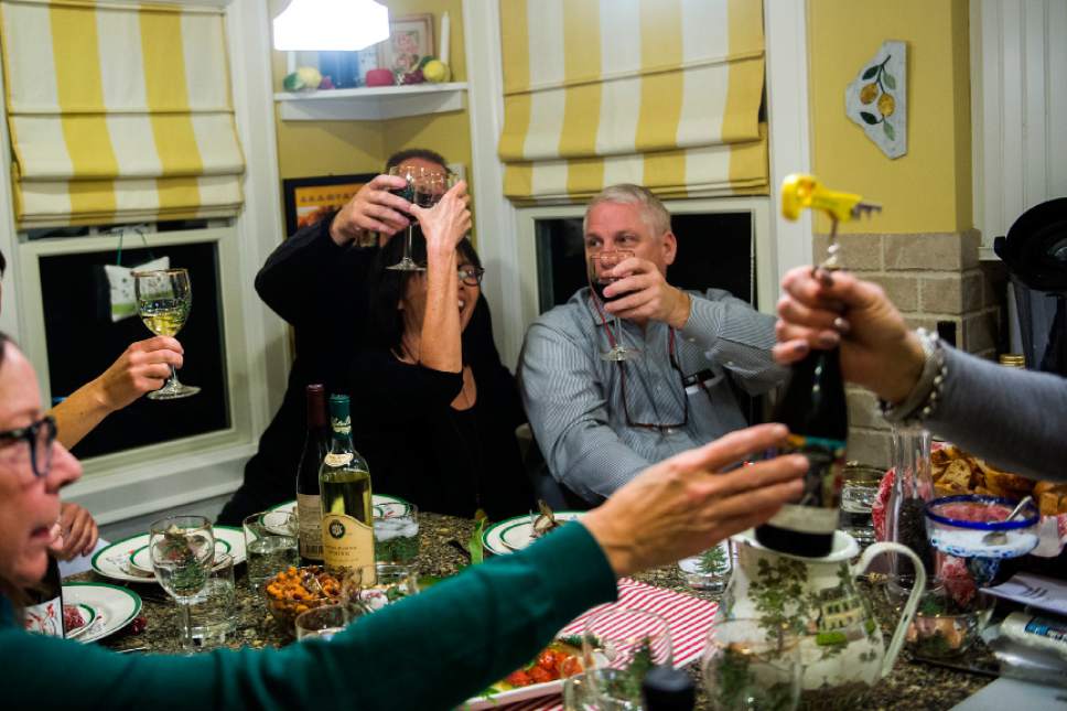 Chris Detrick  |  The Salt Lake Tribune
Students toast wine during a cooking class from instructor Marguerite Henderson in Salt Lake City Tuesday December 6, 2016.