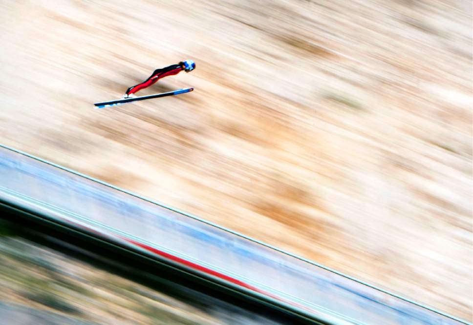 Steve Griffin | The Salt Lake Tribune


USA ski jumper Sarah Hendrickson sails down the hill during practice at the Utah Olympic Park in Park City, Utah Monday July 29, 2013.