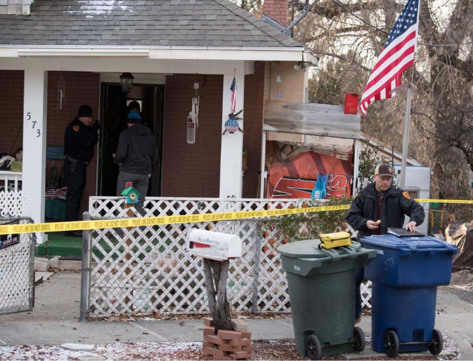 Rick Egan  |  The Salt Lake Tribune
Police investigate the scene of a suspicious death, at 573 Wall St. in Salt Lake City on Saturday.