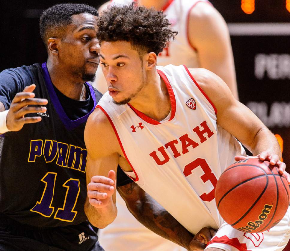 Trent Nelson  |  The Salt Lake Tribune
Utah Utes guard Devon Daniels (3) drives on Prairie View A&M Panthers guard Ja'Donta Blakley (11) as University of Utah hosts Prairie View A&M, NCAA basketball at the Huntsman Center in Salt Lake City, Saturday December 17, 2016.