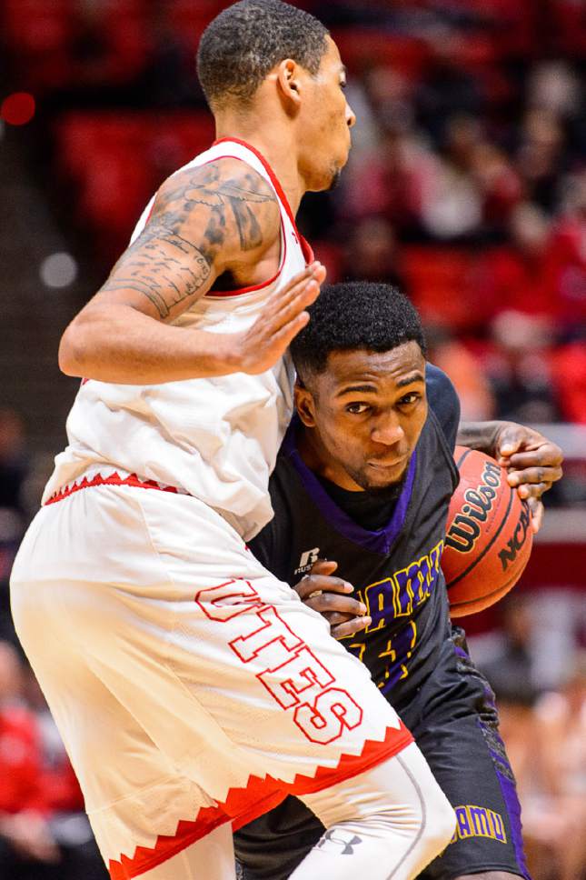 Trent Nelson  |  The Salt Lake Tribune
Prairie View A&M Panthers guard Ja'Donta Blakley (11), defended by Utah Utes guard JoJo Zamora (1) as University of Utah hosts Prairie View A&M, NCAA basketball at the Huntsman Center in Salt Lake City, Saturday December 17, 2016.