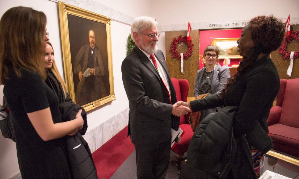 Leah Hogsten  |  The Salt Lake Tribune
l-r Jess Esplin, Mahalia Lotz, University of Utah president David Pershing, Mira Reynolds and Esther Aboussou. The group SLC Against Sex Assault met with President Pershing, admonishing him for the poor wording in a release that called into question the veracity of a reported on-campus rape on Halloween. The group is also requesting more resources for women's services and sex assault prevention at the school.