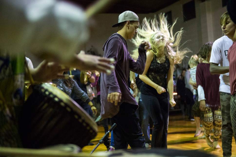 Chris Detrick  |  The Salt Lake Tribune
Participants dance and play drums during a Prayer Dance for Standing Rock at the Krishna Temple in Millcreek on Sunday December 18, 2016.