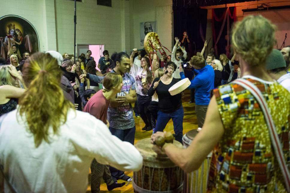 Chris Detrick  |  The Salt Lake Tribune
Participants dance and play drums during a Prayer Dance for Standing Rock at the Krishna Temple in Millcreek on Sunday December 18, 2016.