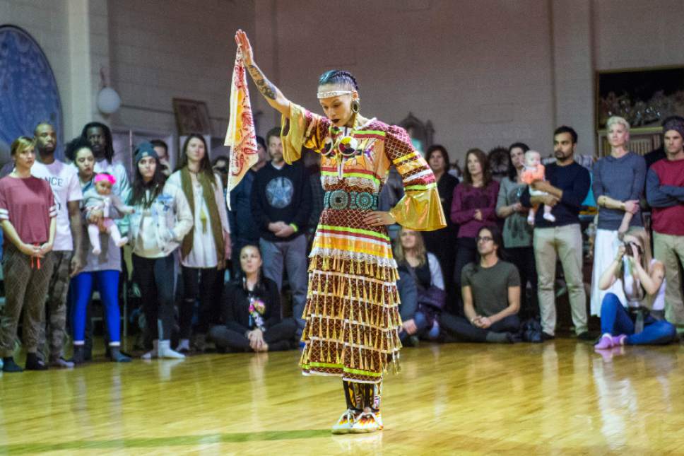Chris Detrick  |  The Salt Lake Tribune
Native American powwow dancer Rhonda DuVall performs a jingle dress healing dance during a Prayer Dance for Standing Rock at the Krishna Temple in Millcreek on Sunday December 18, 2016.
