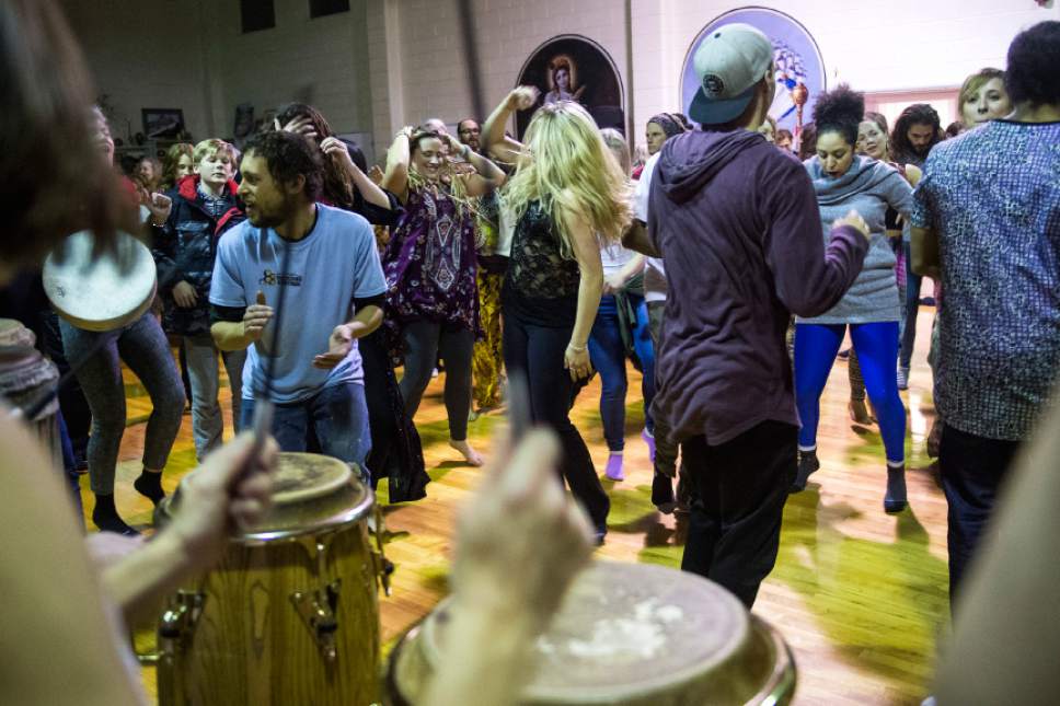 Chris Detrick  |  The Salt Lake Tribune
Participants dance and play drums during a Prayer Dance for Standing Rock at the Krishna Temple in Millcreek, Sunday December 18, 2016.