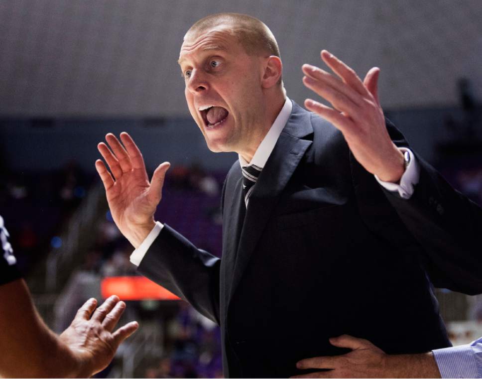 Rick Egan  |  The Salt Lake Tribune

Utah Valley Wolverines head coach Mark Pope reacts to a call by the official, in basketball action, Weber State Wildcats vs Utah Valley Wolverines, n Ogden, Saturday, December 17, 2016.