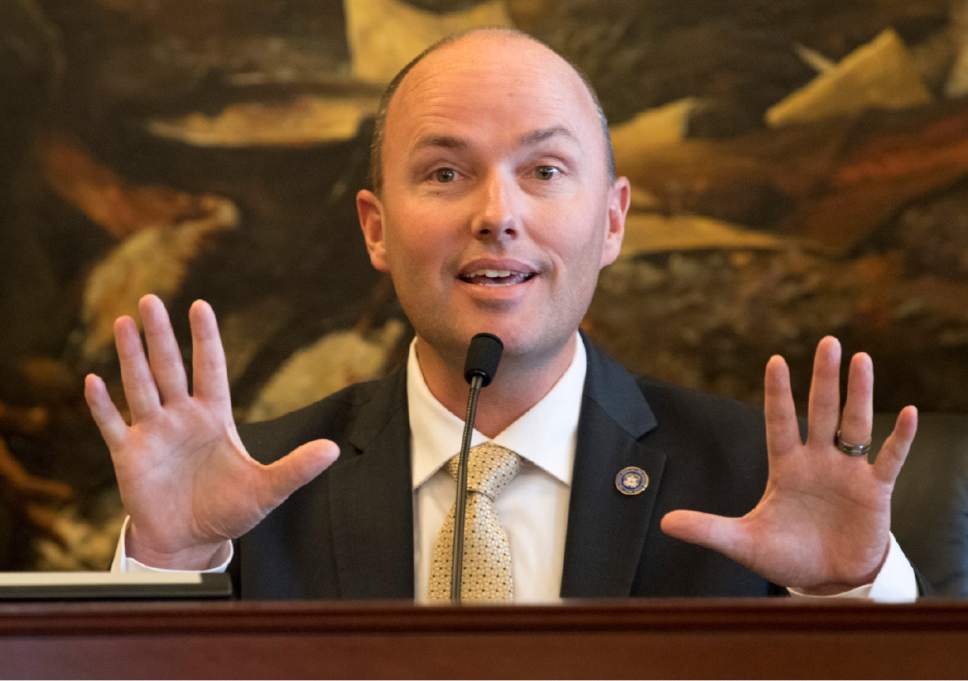 Rick Egan  |  The Salt Lake Tribune

Lt. Gov. Spencer Cox thanks the protestors for coming, and asks those on the front row to lower their signs, so the elementary school children can see the proceedings as Utah's electoral college placed their votes at the Utah State Capitol, Monday, December 19, 2016.