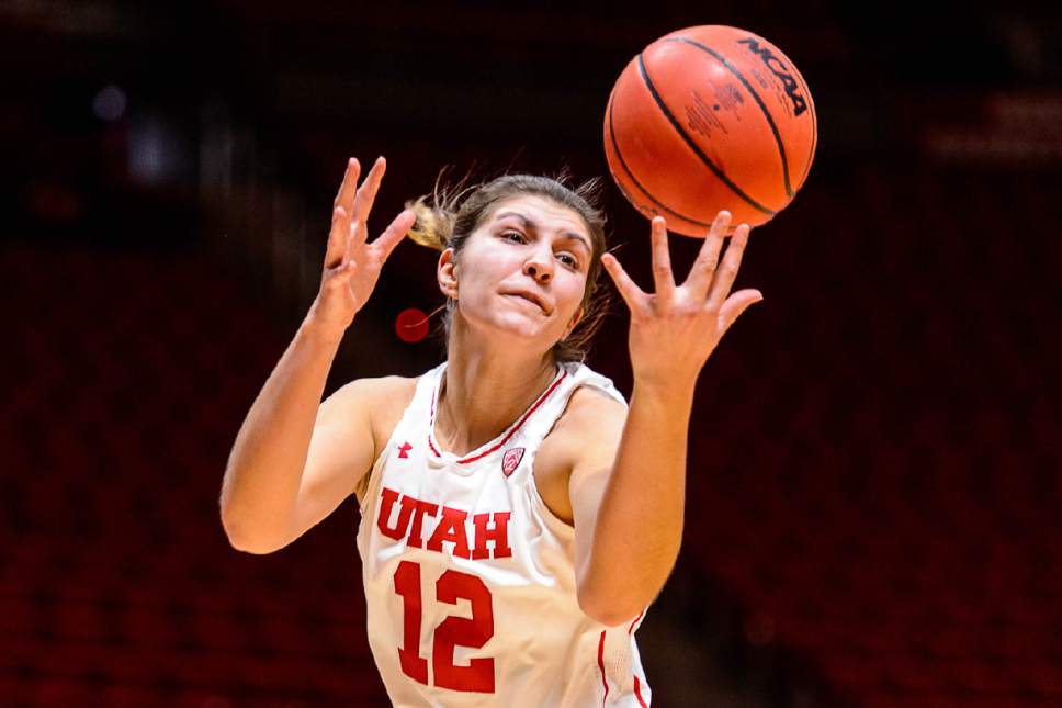 Trent Nelson  |  The Salt Lake Tribune
Utah Utes forward Emily Potter (12) pulls in a rebound, as University of Utah hosts Weber State, NCAA women's basketball at the Huntsman Center in Salt Lake City, Saturday December 17, 2016.