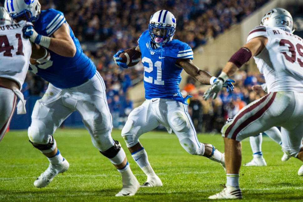 Chris Detrick  |  The Salt Lake Tribune
Brigham Young Cougars running back Jamaal Williams (21) runs the ball during the game at LaVell Edwards Stadium Friday October 14, 2016. Brigham Young Cougars defeated Mississippi State Bulldogs 28-21in double overtime.